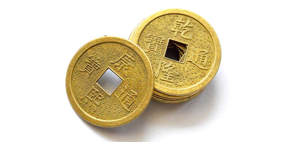 Сәттілік үшін бойтұмар ретінде қытай монетасы